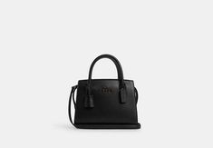 Andrea Carryall | COACH OUTLET Coach Carryall Bag, Coach Carryall, Coach Grace Carryall, Coach Black Satchel For Everyday Use, Black Coach Bag For Daily Use, Sustainable Bag, Coach Outlet, Carry All Bag, Belt Bag