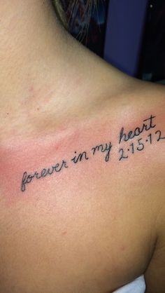 a woman with a tattoo on her shoulder that says, i forever in my heart