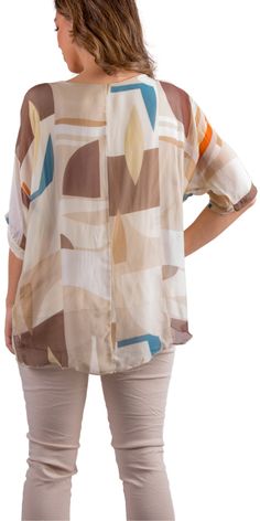 Our Classic Kaftan Style Blouse with Frayed Edge Under Layer Hem with a Graphic Shape Print. 100% Silk // Interior: 95% Viscose, 5% Elastic Fits Sizes XS- XL Made in Italy Relaxed Fit Rayon Shirt For Beach, Relaxed Fit Rayon Shirt For The Beach, Summer Beige Silk Blouse, Beige Silk Blouse For Summer, Silk V-neck Top For Vacation, Silk Blouse For Vacation, Summer Beach Shirt Made Of Rayon, White Viscose Beach Tops, Multicolor Silk Beach Top