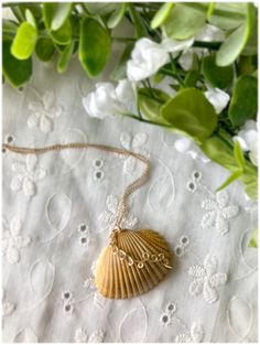 New seashell necklace pendants coming your way! Take a look at this hand collected shell that has been elegantly wrapped in gold wire, don't let this find pass you by!  (chain in photos is not included in purchase) Gold Hand Wrapped Jewelry For The Beach, Beach Gold Hand Wrapped Jewelry, Wire Wrapped Shell Necklaces In Shell Shape, Wire Wrapped Shell Necklaces, Unique Gold Shell Necklaces, Gold Wire-wrapped Necklaces For The Beach, Gold Wire Wrapped Necklace For The Beach, Handmade Gold Shell Necklace, Handmade Gold Shell-shaped Necklace