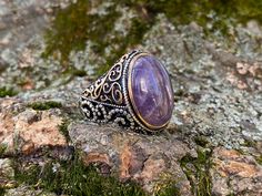 -Stone Type: Amethyst -Stone Dimensions: 2. cm x 1.5 cm -Metal Type: Sterling Silver(925k) & Bronze Details (Yellow Part) -Weight of the Item: 13gr (Approx.) -Stone Texture may differ from the photos All items comes in a special gift box. If you don't see your size, please ask, we may produce your size. You are looking at the high quality handcrafted silver ring. All of our items have been designed and produced by ourselves ,so all our items comes with 1 year warranty as well. International Antique Natural Stones Ring For Gift, Antique Rings With Natural Stones For Gift, Spiritual Gemstone Signet Ring As Gift, Silver Amethyst Ring With Stones As A Gift, Silver Amethyst Ring As A Gift, Silver Amethyst Ring Perfect For Gifting, Silver Amethyst Signet Ring Gift, Amethyst Gemstone Signet Ring As Gift, Purple Gemstone Signet Ring Gift