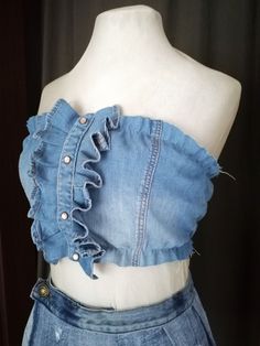 Step into the world of unique, fashionable, and sustainable fashion with our Denim Corset Crop Top, an upcycled chic casual wear that is a perfect blend of style and comfort. This stunning piece is not just a trendsetter but also a statement of your commitment to the environment. It's tailored from high-quality blue denim, designed with a stylish necktie that adds an extra touch of sophistication to the piece. This denim corset is a perfect gift for a fashion-forward woman who values sustainability and style. Avalable ison the pictures is light denim in size S and M from the size chart Lenght: 21 cm/ 8 in The denim skitrt also is available 95$. See it here: https://www.etsy.com/listing/1734456031/cute-mini-pleated-denim-skirt-reworked?click_key=b7731e961bd0e104aa2c0ca2de954785f5f23fcd%3A17 Denim Blue Patchwork Denim Top, Blue Patchwork Denim Top, Summer Denim Top With Patchwork, Blue Denim Patchwork Top, Blue Denim Patchwork Top For Summer, Summer Blue Patchwork Denim Top, Spring Denim Top With Patchwork, Denim Top For Festivals, Blue Recycled Denim Top For Summer