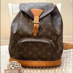 Louis Vuitton Pm Size Montsouris. Has Some Sign Of Wear That Can Be Seen On Pictures. No Cracks Or Any Rips. Interior Is Clean And No Bad Smell. Authentic Bad Smell, Louis Vuitton Bags, Backpack Bags, Louis Vuitton Bag, Bag Lady, Louis Vuitton, Backpacks, How To Wear, Quick Saves