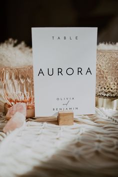 a table with candles and cards on it