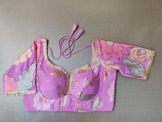 Buy stunning lilac embroidered saree blouse online in USA with lace. Elevate your Indian ethnic saree looks with beautiful readymade saree blouse, embroidered saree blouses, Banarasi saree blouse, designer sari blouses, sleeveless saree blouses from Pure Elegance Indian fashion store in USA.-front Fitted Lavender Choli For Festivals, Bollywood Style Purple Choli With Floral Embroidery, Elegant Purple Saree With Floral Embroidery, Semi-stitched Purple Choli With Floral Embroidery, Purple Blouse Piece With Resham Embroidery For Navratri, Lavender Zari Work Blouse Piece For Wedding, Purple Semi-stitched Choli With Floral Embroidery, Designer Purple Blouse Piece For Navratri, Lavender Blouse Piece With Zari Work For Wedding