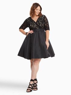 Stealing the spotlight at your next event is guaranteed with this get-the-party-started dress. The 3/4 sleeved bodice features gorgeous black lace laid over a silky nude lining (the contrast is stunning). The black taffeta skirt has dancing-all-night in mind with a multi-layered tulle underlay.<div><br></div><div><b>Model is 5&#8217;9.5&#8221;, size 1&nbsp;<br></b><div><ul><li style="list-style-posit... Plus Size Black Wedding Dress, Black Taffeta Skirt, Party Dresses With Sleeves, Taffeta Skirt, Blush Dress, Plus Size Cocktail Dresses, Plus Size Party Dresses, Surplice Dress, Taffeta Dress