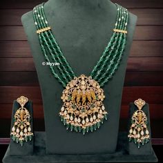 Sabyasachi inspired uncut polki & pearl ganesha necklace set/Emerald green rani haar/Premium dull gold plated temple jewelry/South indian   All orders Ship same day if placed before 4:00 PM EST  Necklace length: Adjustable length Create beautiful memory for any occasion with elegant jewelry for your loved ones We will be happy to navigate you through the process so if you have any questions regarding our product before placing an order reach out to us and we will be there to help you.  Thank you Festive Emerald Kundan Chandbali Necklace, Festive Chandbali Kundan Necklace With Emerald, Emerald Kundan Necklace With Intricate Design For Festive Occasions, Festive Emerald Kundan Necklace With Intricate Design, Traditional Kundan Emerald Necklace For Festivals, Traditional Emerald Kundan Necklace For Festivals, Kundan Temple Jewelry Necklace With Stone Work, Green Chandbali Bridal Necklace For Rituals, Festive Emerald Kundan Necklace