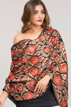 "Our Mandira Embroidered Shawl features exquisite multicolor embroidery on soft 100% viscose that has the look and feel of wool, but can be worn by people with wool sensitivities. This fine embroidered shawl showcases the intricate embroidery traditions of Northern India in rich earthen hues on a black base. Sevya offers a stunning collection of embroidered Indian shawls, in a range of patterns and colors to suit any occasion. Dimensions: 28\" x 72\"" Poem Inspiration, Multicolor Embroidery, Embroidered Shawl, Floral Shawl, India Colors, Lace Heart, Wool Shawl, Women Shawl, Long Scarf