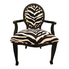 zebra print upholstered chair with black frame