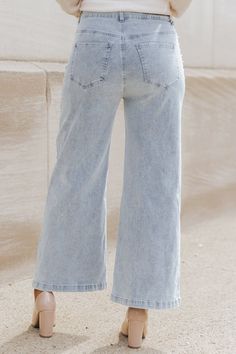 Elevate your denim game with our Light Wash Pearl Detail Cropped Jeans! These high-rise jeans feature a wide leg design, crafted from a blend of 75% cotton, 23% polyester, and 2% spandex for a comfortable fit. The pearl detailing adds a touch of sophistication, making these perfect for any occasion! Style with a cute fall sweater, strappy heels, and elevated accessories for a chic everyday look. Denim Blue Wide-leg Jeans For Fall, Wide-leg Cropped Denim Jeans With Pockets, High Rise Dark Wash Cotton Flare Jeans, Fall Washed Wide Leg Cropped Jeans, Wide Leg Washed Cropped Jeans For Fall, Wide-leg Washed Cropped Jeans For Fall, Casual Non-stretch Wide Leg Cropped Jeans, Casual Wide Leg Non-stretch Cropped Jeans, Spring Non-stretch Wide Leg Jeans