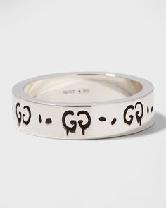 Gucci ring featuring engraved GucciGhost motifs..925 sterling silver..Approx. 0.2'W (6mm)..Made in Italy. Designer Gucci Rings With Polished Finish, Classic Gucci Engraved White Gold Ring, Luxury Silver Jewelry With Engraved Logo, Gucci Silver Ring With Polished Finish, Classic Gucci Engraved Ring As Gift, Classic Gucci Engraved Ring For Anniversary, Classic Gucci Engraved Ring For Gift, Gucci Sterling Silver Ring, Gucci White Gold Sterling Silver Ring