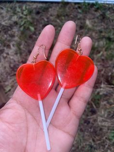 "Cute BIG, HEART + LOLLIPOP earrings. Colors are red and gold. Has a little bit of scratches. sold as is. Style: Hipster, punk, Kitsch, goth, gothic, punk, Kawaii, Boho, Hippie, Retro. For pierced ears. Perfect for Valentines and Halloween. Great Birthday gift. approximate measurements: body of earrings: 3\" L x 1 3/8\"W drop of earrings: 3 3/4\" L" Red Heart Lollipop, Punk Kawaii, Lollipop Earrings, Valentines Day Earrings, Heart Lollipop, Balloon Earrings, Red Heart Earrings, Goth Earrings, Sweet Earrings