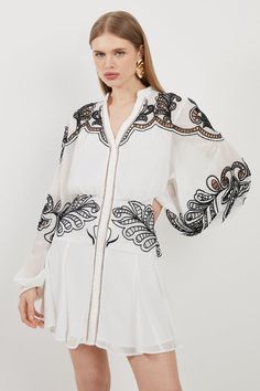 Detailed With Opulent Embroidery, This Mini Dress Exudes Artisanal Allure. Puff Sleeves Add An Element Of Drama, While A Cut Out Neckline Exudes Feminine Appeal. A Swaying Skirt Adds A Feminine Finish, Style This Piece With Heels For An Elevated Occasion Ensemble Or Sandals For A Casually Elegant Outfit.Mini Lengthlong Sleevesembroidery Detailv-Neckline Hen Do Outfits, Plus Size Workwear, Blouse Ideas, Outfits For Mexico, Casual Work Dresses, Spring Wedding Guest Dress, Ibiza Outfits, Bachelorette Outfits, Fall Wedding Guest Dress