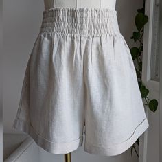 Glassons Linen Blend Smocked High Waist Shorts In Beige. Size 10 Equiv To A Small. Brand New With Tags. Waist 13.5" Inseam 3" Cotton Bottoms With Gathered Waist For Vacation, Summer Bottoms With Gathered Waist And Relaxed Fit, Relaxed Fit Bottoms With Gathered Waist For Vacation, White Bottoms With Gathered Waist For Summer, Cotton Beach Bottoms With Gathered Waist, Beach Cotton Bottoms With Gathered Waist, Beach Bottoms With Gathered Waist In Cotton, Summer Vacation Bottoms With Gathered Waist, Chic Bottoms With Gathered Waist, Short Length