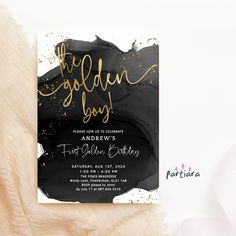 a black and gold foil birthday party card with the words, the golden boy on it