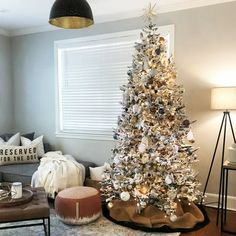 a decorated christmas tree in a living room