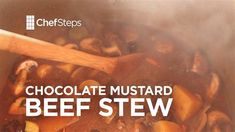 beef stew with mushrooms and carrots cooking in a large pot on the stove top text reads chocolate mustard beef stew