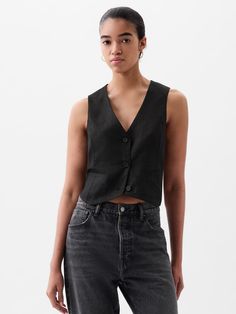 Soft linen-cotton vest.  V-neck.  Sleeveless.  Button front.  * Fit: Slightly fitted.  Sits close to the body.  Hits at the hip.  Note: Oriane Serveille is wearing a Gap Linen Vest, Cotton Vest, Gap Jacket, Sweater Tank Top, Vest Outfits, Formal Style, Work Wardrobe, Time Capsule, Black Linen