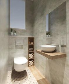 a white toilet sitting next to a sink in a bathroom under a window on top of a wooden shelf