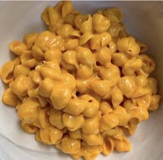 a white bowl filled with macaroni and cheese