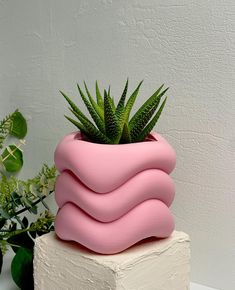 Melting Donut Tabletop Planter - 12 Color Options Bring a pop of playful design to your indoor garden or workspace with this unique Melting Donut Tabletop Planter! Crafted in the quirky shape of a melting donut, this compact planter makes a perfect home for small succulents, cacti, or even herbs. Measuring 7.2 cm in width and 8.1 cm deep inside, it's an ideal size to fit on desks, shelves, or windowsills without taking up too much space. Available in 12 vibrant color options, this planter adds a touch of fun and whimsy to any room's decor. Made from high-quality, durable materials, it's designed to last, with a smooth matte finish that's easy to clean. Great for plant lovers or as a thoughtful gift. Tabletop Planter, Small Succulents, Planter Pots Indoor, Perfect Home, Indoor Planters, Window Sill, Indoor Garden, Plant Lover