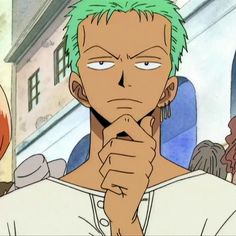 an anime character with green hair is looking at the camera and has his hand under his chin