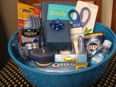 a blue basket filled with lots of different items