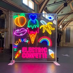 an illuminated sign that says electric confetti