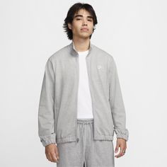 Clean and classic, this knit full-zip top gives you a versatile midweight layer you can wear throughout the year. Nike Track Jacket With Ribbed Cuffs For Fall, Nike Gray Outerwear With Ribbed Cuffs, Nike Gray Cotton Outerwear, Casual Nike Fleece Jacket, Heather Grey Athleisure Outerwear For Fall, Nike Crew Neck Outerwear For Fall, Nike Cotton Track Jacket Casual Style, Nike Cotton Track Jacket For Fall, Nike Cotton Casual Track Jacket