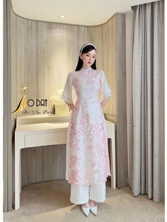 "🌿 This set includes traditional Ao Dai, pants For Girls Style: Modern Material: Very well made with high-quality double layers silk Collar: 2cm collar Please provide bust-waist-and hip measurements when placing your order to ensure the best fit for you. 🌿 NOTE: * Recommend gentle washing * Please contact us for any inquiries about size. We don't have an exchange policy for the wrong size * It is safe for a washer and dryer in a \"delicate\" setting. * Actual Ao Dai colors may differ up to 10% due to lightning and viewing devices. * These ao dai pants are made based on Vietnamese size; they will run smaller than American size. *3D printed ao dai: you may see some white broken fabric around the seam (collar). *There might be some chalk/ pen writings on the fabric because it is brand new, Traditional White Ao Dai With Short Sleeves, Traditional White Short Sleeve Ao Dai, Traditional White Cheongsam For Summer, Traditional White Ao Dai With Floral Embroidery, Traditional White Summer Cheongsam, Traditional White Cheongsam With Stand Collar, Festive White Embroidered Ao Dai, Festive Embroidered White Ao Dai, Traditional White Cheongsam For Spring