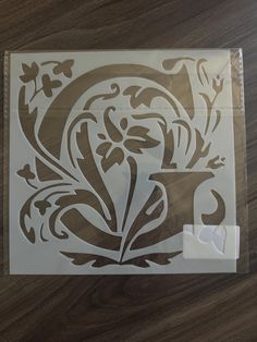 a clear sticker with an ornate design on it