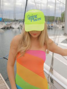 Whether you're going cross country or across the sea, this is the hat you need! This bright hot pink trucker with yellow embroidery screams summertime! Affordable Multicolor Sports Trucker Hat, Yellow Curved Brim Baseball Cap For Summer, Yellow Trucker Hat For The Beach, Trendy Yellow Trucker Hat For Summer, Trendy Yellow Baseball Cap For Summer, Fun Yellow Trucker Hat For Spring, Yellow Snapback Trucker Hat For Summer, Trendy Yellow Trucker Hat For The Beach, Fun Yellow Trucker Hat For Summer