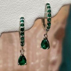 Gorgeous Dainty 925 Stamped Sterling Silver Green Emerald Crystal Diamond Huggie Style Hoop Dangle Drop Earrings. Please Note: These Are Meant To "Hug" Or Come Close To Your Earlobes. Last Picture Is For Size Reference. Brand Newno Attached Tags. Bundle & Save :) Thanks For Checking Out My Closet. Have A Happy, Safe, & Blessed Day. (2) Silver And Green Earrings, Silver Shamrock, Antique Gold Earrings, Lavender Earrings, Crystal Teardrop Earrings, Emerald Crystal, Casual Earrings, Spring Earrings, Spike Earrings