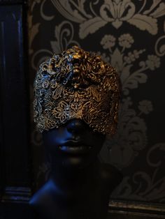 This beautiful mask is made using metalwork and finished with a lush gilt varnish in either silver or gold. We can also finish this mask with silver / gold leaf. Mask pictured is finished with silver paint.  While giving the illusion of being blind this mask can be seen through. As this mask is made to order please allow 6-8 weeks to process. Made as blind illusion as standard - secured with adjustable elastic If choosing 'custom' as your finish, please leave 'custom' request in notes, if this i Gold Venetian Eye Mask For Masquerade, Gold Venetian Masquerade Mask For Evening, Elegant Gold Masks And Prosthetics For Masquerade, Gold Mask For Mardi Gras Evening, Formal Gold Eye Mask, Gold Masks For Mardi Gras Evening, Gold Masks For Mardi Gras Evening Events, Gold Eye Mask For Mardi Gras, Elegant Gold Mask