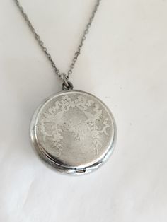 Beautiful sterling silver antique locket pill box. Lined in a soft white gold. Marked sterling. Approximately 3/4 of an inch across. hinged lid snap shut. 18-in chain Silver Necklace Locket, Silver Locket Necklace, Antique Locket, Silver Locket, Locket Pendant Necklace, Silver Lockets, Purse Accessories, Hinged Lid, Locket Necklace