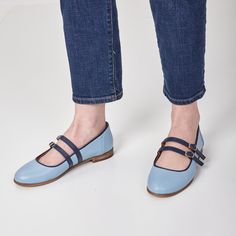 These modern Mary Janes offer a fresh twist on a classic silhouette, perfect for adding a pop of colour to your spring wardrobe.  Crafted with attention to detail, the double strap design provides both style and functionality, ensuring a secure and comfortable fit. The crystal blue color with contrasting navy straps and piping details exudes sophistication and versatility, making these shoes a standout choice for any occasion.  PRODUCT INFO: Premium leather upper Ultra smooth nappa leather linin Blue Round Toe Flats For Summer, Blue Flats With Rubber Sole And Round Toe, Blue Flats With Round Toe And Rubber Sole, Blue Slip-on Flats With Rubber Sole, Blue Flats With Leather Sole And Round Toe, Blue Closed Toe Flats For Spring, Blue Ballet Flats, Zapatos Mary Jane, Mary Jane Shoes Flat