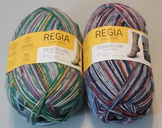 two balls of yarn sitting next to each other on a white counter top, with the label regia design line