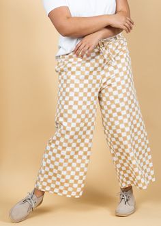 The shore pant is the quintessential bottom that's both comfortable and cool. With its modern cropped length, relaxed fit, high rise, and elastic waist, this go-to favorite brings effortless, elevated style to every look. Alexa is 5'9", wearing size L/XL. Organic cotton twill GOTS certified Relaxed fit with elastic inset waist Exterior draw cord at center waist Back slip pocket with frayed edge Side welt pockets Hand loomed & block printed Machine wash Made in India Elevated Style, Welt Pockets, Get Dressed, Welt Pocket, Cotton Twill, Block Print, Sustainable Fashion, Pajama Pants, Elastic Waist