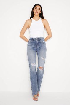 Embrace a flattering and versatile fit with the Good Icon Straight Leg Jean by Good American. This iconic straight-leg silhouette offers a timeless look that complements various body types.The high-waisted design sits at your natural waist, elongating... Fitted Bottoms With Five Pockets And Straight Silhouette, Fitted Straight Silhouette Jeans, Fitted Bottoms With Straight Silhouette For Spring, Best Icons, Good American, High Waisted Denim, Straight Jeans, Body Types, Straight Leg Jeans