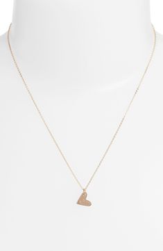 From humble beginnings to a fully staffed warehouse in Oregon, Nashelle remains true to its original purpose-handmade jewelry crafted with love and intention. The heart initial necklace is no different-with a hand-stamped pendant anchored by a single ring, it makes for a perfect layering piece. Style Name:Nashelle 14K-Gold Fill Initial Mini Heart Pendant Necklace. Style Number: 5143637. Available in stores. Delicate Heart Charm Necklace For Mom, Delicate Heart Charm Necklace As Gift For Mom, Delicate Heart Charm Jewelry For Mom, Delicate Heart Charm Jewelry Gift For Mom, Delicate Heart Charm Jewelry As Gift For Mom, Delicate Jewelry With Heart Charm For Mom's Gift, Delicate Jewelry With Heart Charm For Mom, Minimalist Heart Charm Jewelry For Mom, Dainty Heart Beads Jewelry For Anniversary Gift