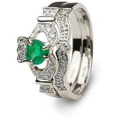 an emerald and diamond wedding ring set