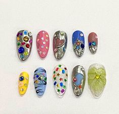 ✨ Thank you for visiting our store. We hope you will choose a nail set that is right for you. Because a beautiful nail set not only enhances the beauty of the hands but also shows the user's style and personality. ✨I always put my whole heart into each of my nail sets. So I hope you will be satisfied when you receive it. ✨ Size  ( Thumb , Index , Middle , Ring , Pinky ): XS : 14 , 10 , 11, 10 , 8mm  S : 15 , 11, 12, 11 ,9 mm M : 16 , 12, 13, 12,9 mm  L : 17 , 13 , 14 , 13, 10 mm If you are unsur Jewel Tone Nail Designs, Swag Nails Designs, Whimsigoth Nails, Kidcore Nails, Nails With Stickers, Aura Nail, Nail Medium, Nails Goth, Gothic Y2k