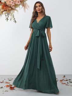 Product Code: FSWD0939 Embellishment: Chiffon Fabric: 100% Polyester Back Style: Zipper Up Fully Lined: Yes Built-in Bra: No Available Color: Dark Green Stretch: Moderate Fits true to size Imported Model Information: Height: 5' 2" Bust: 33.5'' Waist: 24“ Hips: 35.5” wearing US size Small Dark Green Bridesmaid, Fall Bridesmaid, Latest Bridesmaid Dresses, Dark Green Bridesmaid Dress, Cute Formal Dresses, Mother Of The Groom Dress, Fall Bridesmaid Dresses, West Wedding, Green Bridesmaid