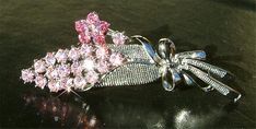 PERFECT GIFT /WEDDING GIFT FOR BRIDE / BRIDESMAID / LADY!This sparkling SWAROVSKI AUSTRIAN Crystals TWO TONE Pink Rose FLOWER BOUQUET pin measuring 1 3/4" wide X 2 3/4" high (45mm X 70mm)Great piece for your collection!===================Prices are in US$.For shipping policies and other important information, click on “profile” on the right.See an item that you like but has already been sold? Contact me to see if I have more!Thank you for stopping by Kashuen Collectibles! Elegant Pink Wedding Brooches, Silver Flower Brooch For Wedding, Pink Flower Brooch For Wedding, Pink Wedding Brooch With Flower Decoration, Silver Wedding Brooch With Flower Decoration, Silver Wedding Brooches With Flower Decoration, Silver Flower Wedding Brooches, Rose Pink Flower, Rose Flower Bouquet