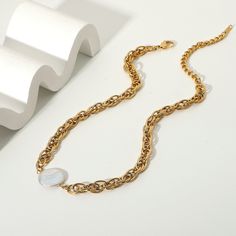 The Flat Pearl Pendant Necklace, with its sleek 18k gold-plated setting, showcases a modern take on the classic pearl. Its minimalist design is perfect for adding a touch of contemporary elegance to any look. First Things First, Pearl Chain Necklace, Gold Water, Coin Pearls, Vintage Pearl, Pearl Pendant Necklace, Vintage Pearls, Stunning Necklace, Pearl Chain