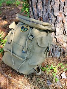 Khaki Backpack With Pockets For Outdoor Activities, Durable Green Backpack For Camping, Durable Backpack For Camping, Durable Hiking Backpack, Durable Standard Backpack For Camping, Khaki Waxed Canvas Backpack For Outdoor, Khaki Backpack For Adventure, Khaki Standard Backpack For Adventure, Khaki Adventure Backpack