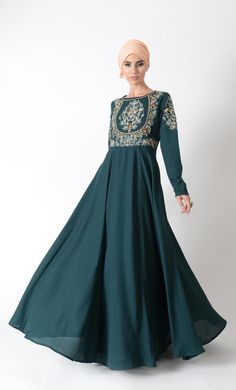 Featuring a traditional modest wear abaya dress in polyester moss crepe fabric adorned with floral thread, dabka and zardozi applique work on the front bodice and sleeves. It is slightly fitted around the waist for fit and flared look to an ensemble along with pleated panels all over the flared bottom skirt.FIT : Relaxed fit.COMPOSITION : Polyester moss crepe.CARE : Dry clean only. Matching Abaya color plain hijab 20" x 70" included Eid Long Georgette Abaya, Long Georgette Abaya For Eid, Eid Maxi Gown With Intricate Embroidery, Eid Gown With Intricate Embroidery In Maxi Length, Embroidered Long Dress For Eid, Traditional Long Sleeve Georgette Abaya, Eid Maxi Dress With Intricate Embroidery, Long Dress With Dabka For Eid, Long Dabka Dress For Eid