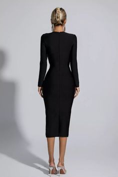 Addilyn Black Hollow Out Bandage Midi Dress Elegant Fitted Midi Dress With Cut-out Waist, Elegant Bodycon Dress With Cut-out Waist For Party, Elegant Cut-out Waist Bodycon Dress For Date Night, Elegant Bodycon Bandage Dress For Club, Elegant Midi Dress With Cut-out Waist For Cocktail, Chic Evening Bodycon Dress With Cut-out Waist, Fitted Bandage Dress For Formal Occasions, Elegant Fitted Bodycon Dress With Cut-out Waist, Fitted Midi Dress With Cut-out Waist For Party