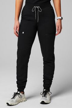 On-Call Scrub Jogger Fabletics black female Activewear >> Scrubs >> Bottoms >> Product Feed MotionTech regular Shoes To Wear With Black Scrubs, Figs Black Scrubs, Scrub Sets For Women, How To Make Scrubs Look Cute, Physical Therapy Outfit Work, Black Scrubs Aesthetic, Best Scrubs Uniform For Women, Scrub Outfits Cute, Scrubs Uniform Cute Black Women