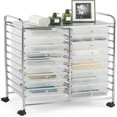 a large metal rack with many drawers on wheels